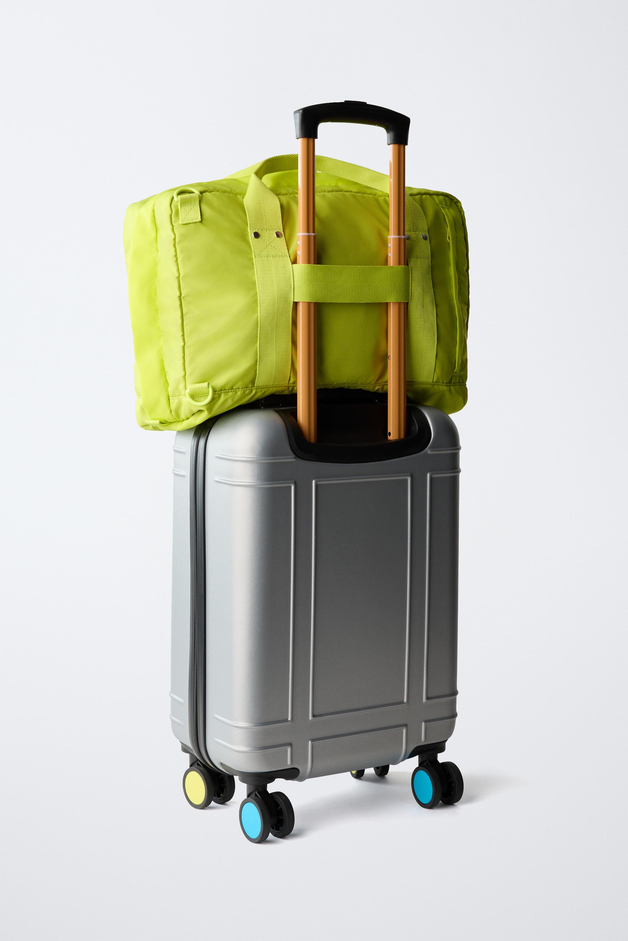 MULTI-COLOR TRAVEL SUITCASE